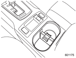 The dual cup holder is built into the center console.