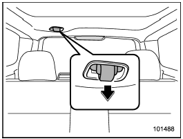 The rear center seatbelt is stowed in a