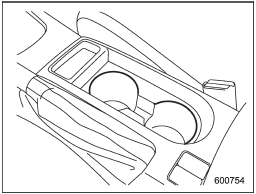 A dual cup holder is built in the center console, beside the parking brake lever.