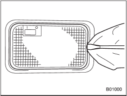 1. Remove the lens by prying the edge of the lens with a flat-head screwdriver.