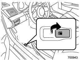1. To open the fuel filler lid, pull the lid release lever up. The lever is on