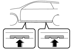 8. Place the jack under the side sill at the front or rear jack-up point closest