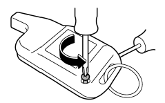 1. Remove the small Phillips type screw located on the back side lower left corner