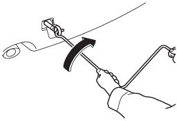 4. Tighten the towing hook securely using the jack handle.