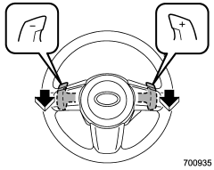 Pull the + of the paddle shift to upshift one level. Also pull the − of the