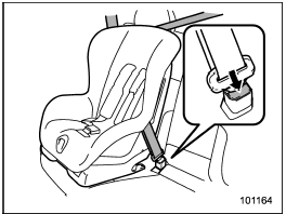 9. To remove the child restraint system,