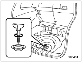 16. Store the flat tire in the spare tire