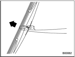 3. Pull the wiper blade assembly toward