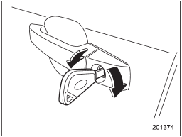 To lock the drivers door from the outside with the key, turn the key toward the rear.