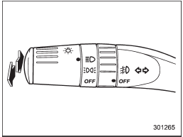 To change from low beam to high beam, push the turn signal lever forward. When the headlights are on high beam, the high beam indicator light  on the