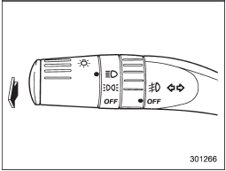 To flash the headlights, pull the lever toward you and then release it. The high beam will remain on for as long as you hold the lever. The headlight flasher works even though the light switch is in the OFF position.