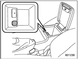 Accessory power outlets are provided below the climate control dials and in the center console. Electrical power (12V DC) from the battery is available at any of the outlets when the ignition switch is in either the Acc or ON position.