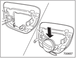 3. Set the fuel filler cap on the cap holder inside the fuel filler lid (turbo models).