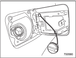 4. Hook the cord that is attached to the fuel filler cap onto the hook inside the fuel filler lid (non-turbo models).