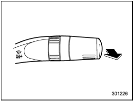 For a single wipe of the wipers, pull the lever toward you. The wipers operate until you release the lever.