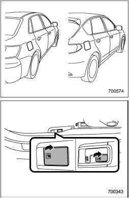 1. To open the fuel filler lid, pull the lid release lever up. The lever is on the floor at the left of the drivers seat.