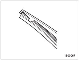 Securely retain both ends of the rubber with the stoppers on the plastic support ends. If the rubber is not retained properly, the wiper may scratch the rear window glass.