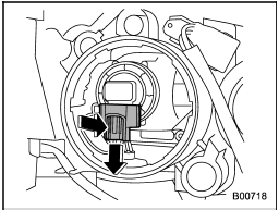 4. Disconnect the electrical connector from the bulb.