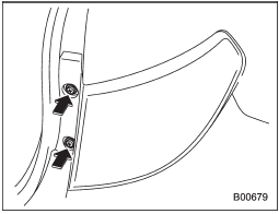 1. Using a Phillips screwdriver, remove the upper and lower screws that secure the rear combination light assembly.