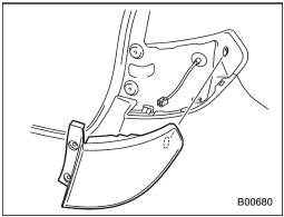 2. Slide the rear combination light assembly rearward and remove it from the vehicle.