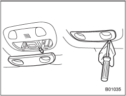 1. Remove the lens by prying the edge of the lens with a flat-head screwdriver.