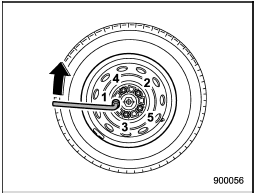 15. Use the wheel nut wrench to securely tighten the wheel nuts to the specified torque, following the tightening order in the illustration.